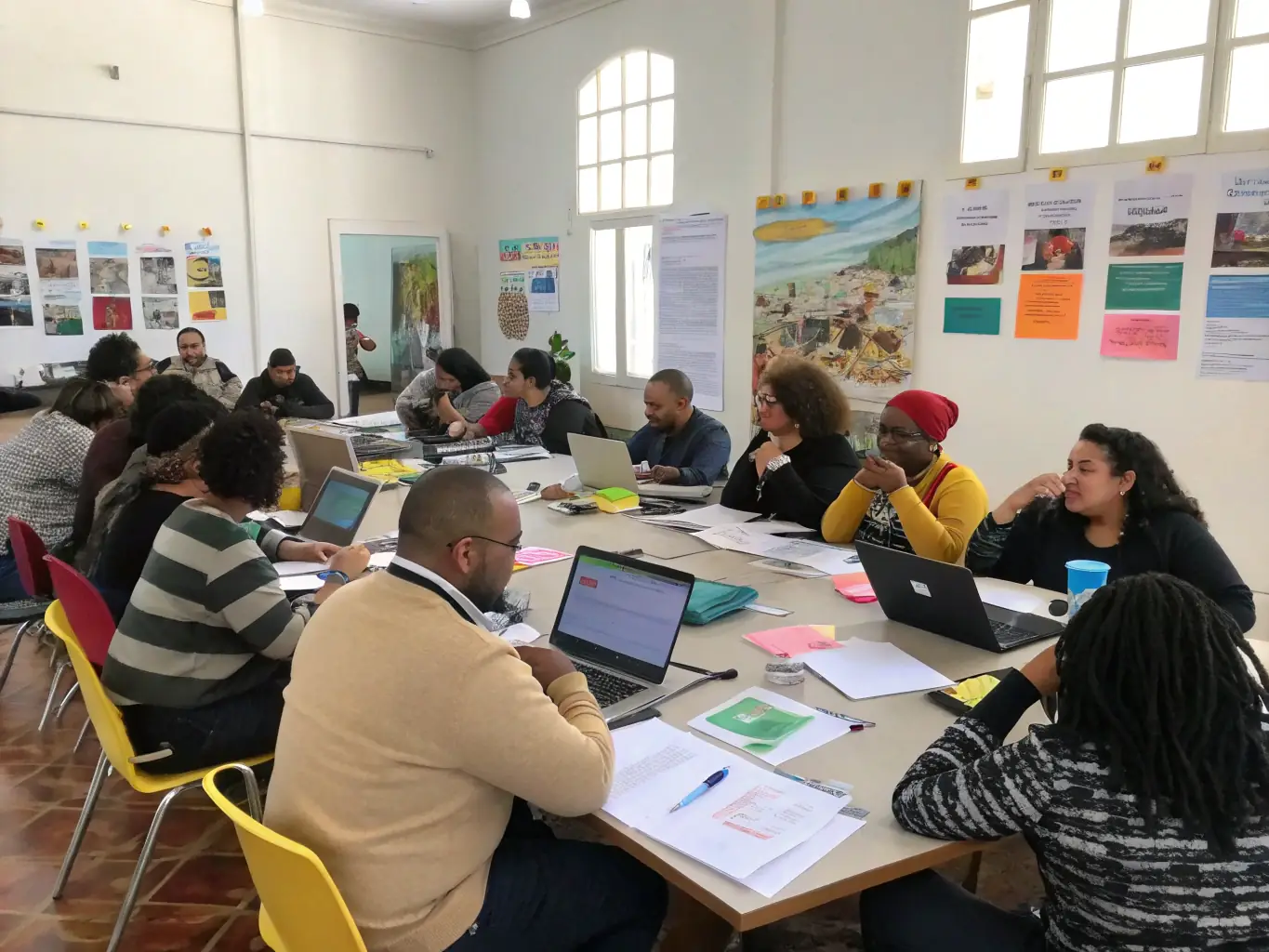 An image of a diverse group of people participating in a Prolog Heritage workshop, showcasing hands-on learning and collaboration.